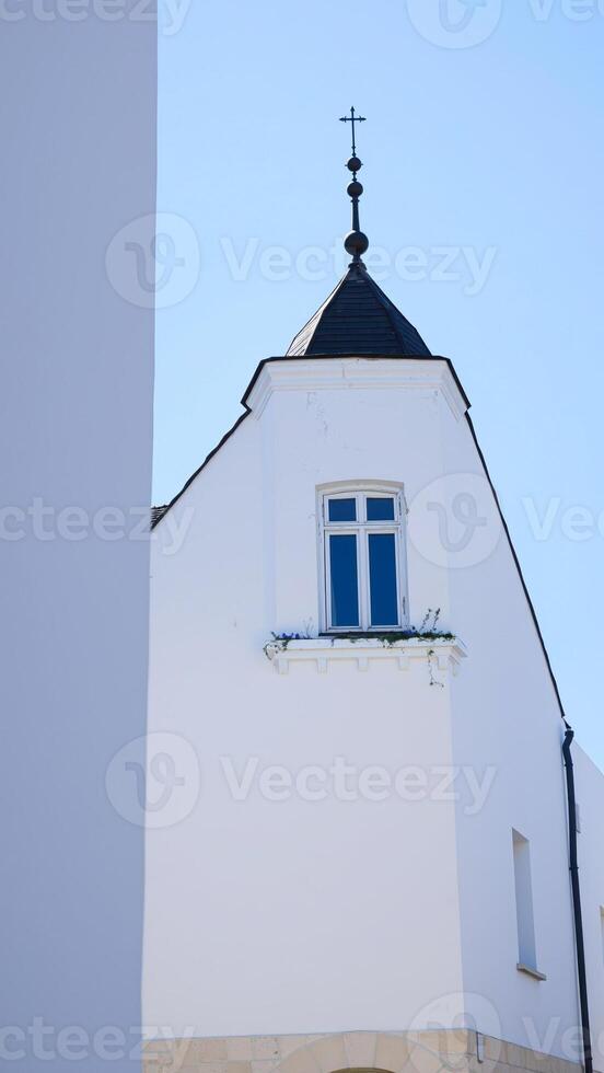white building with a on top photo