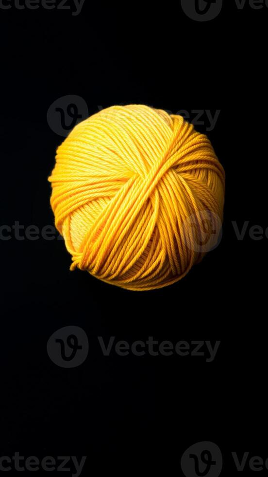single ball yellow yarn photo