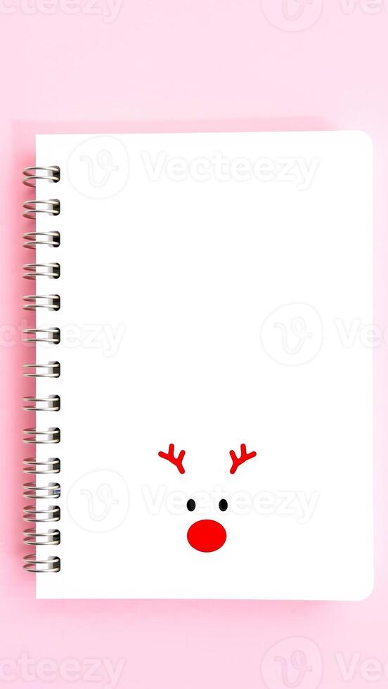 simple reindeer drawing on a white notebook photo
