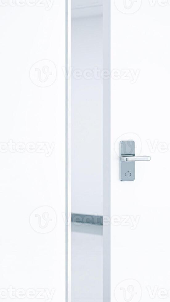 slightly ajar white door with a silver handle photo