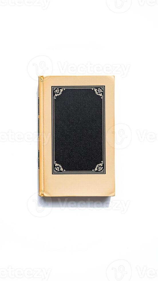 vintage book with intricate gold-leaf designs photo