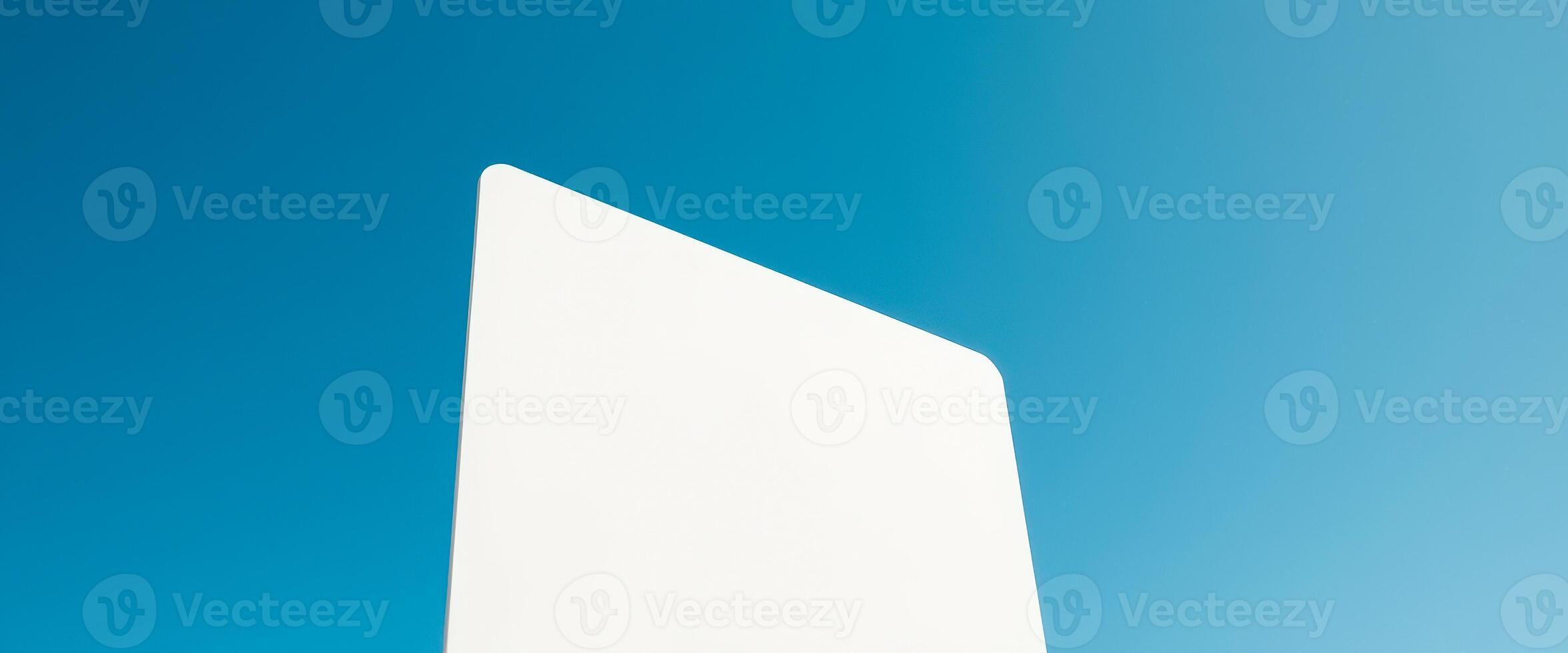 white blank surface against a blue sky photo