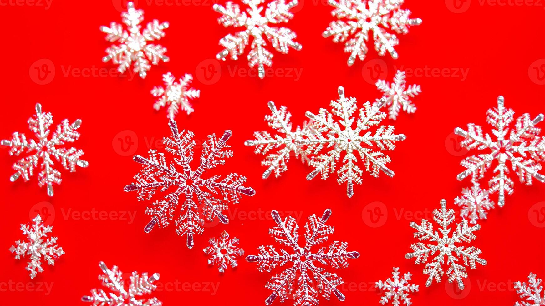 silver snowflakes on a red background photo