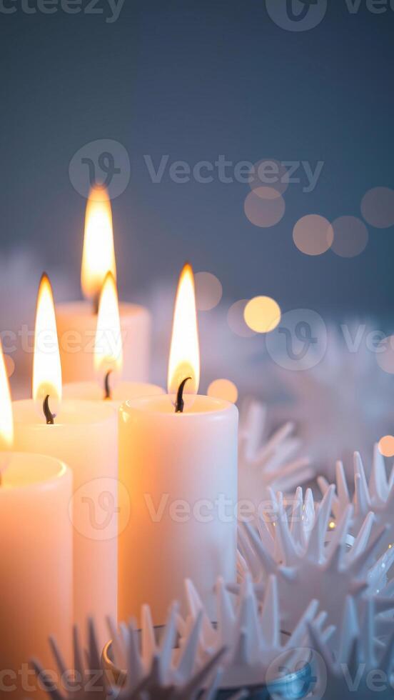 lit candles with star ornaments photo