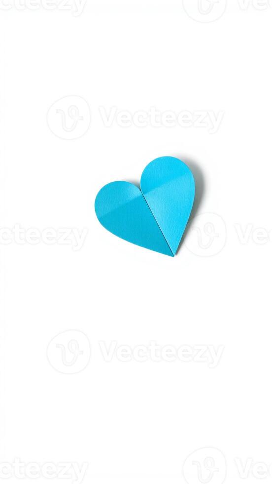 light blue paper heart folded half photo