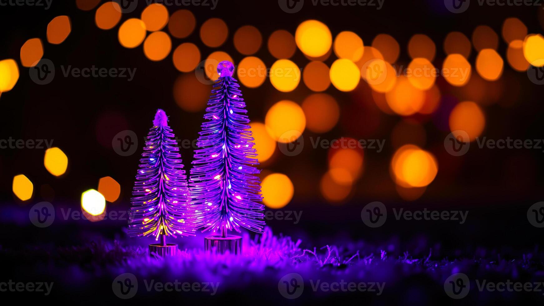two small sparkly trees glowing on purple grass photo