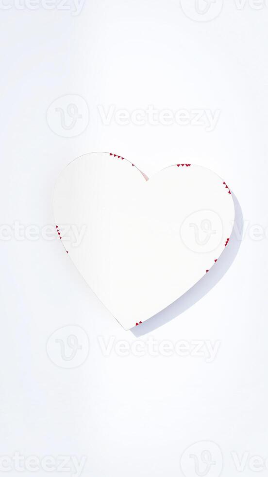 white paper heart with red trim photo
