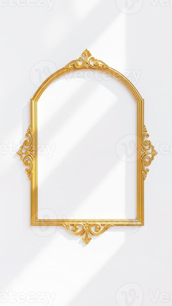 ornate gold frame against a white wall photo