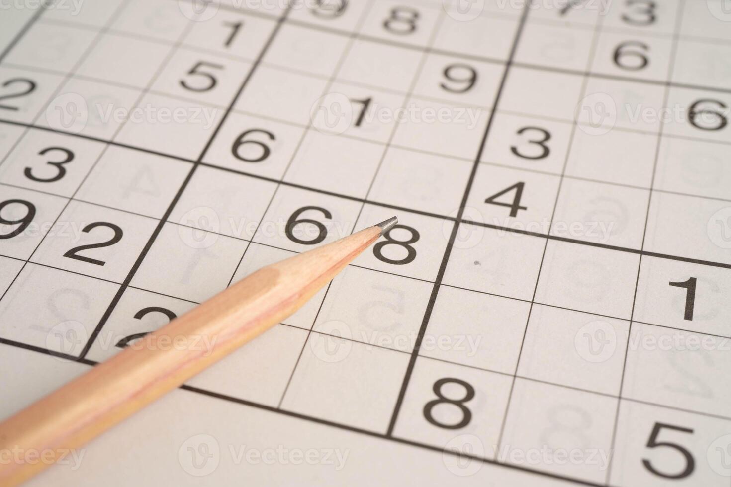 Sudoku puzzle, game to play for keep you brain younger for developing Alzheimer disease in senior patient. photo