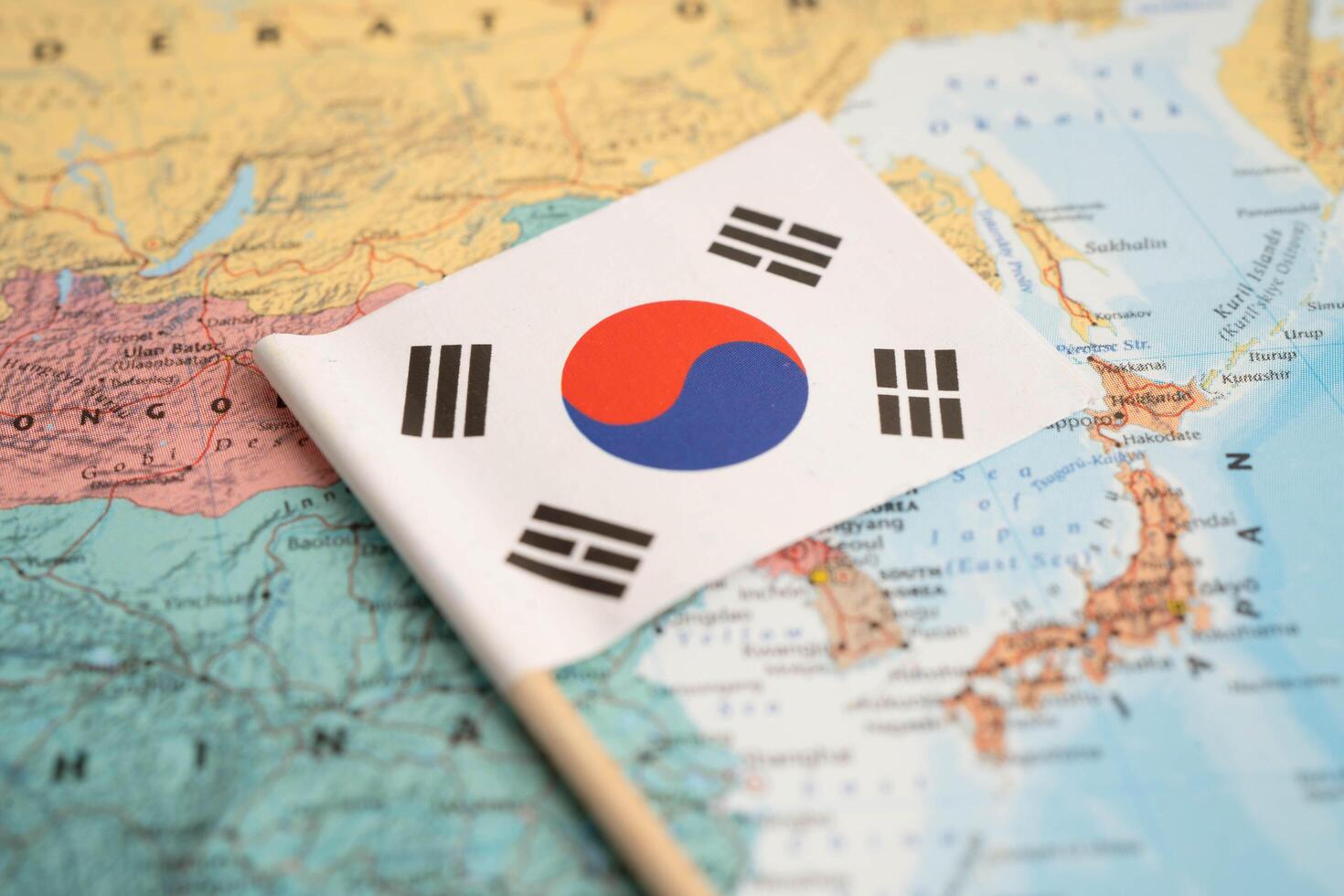 Bangkok, Thailand December 10, 2023 South Korea map in world map paper. photo