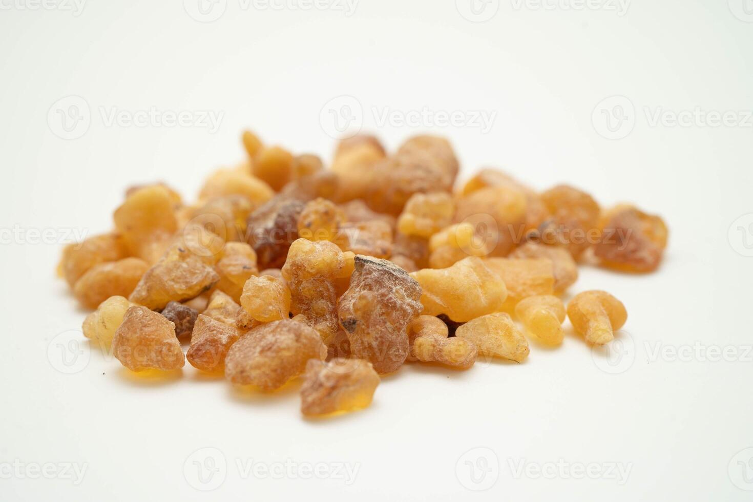 Frankincense or olibanum aromatic resin isolated on white background used in incense and perfumes. photo