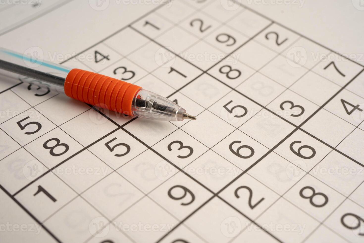 Sudoku puzzle, game to play for keep you brain younger for developing Alzheimer disease in senior patient. photo