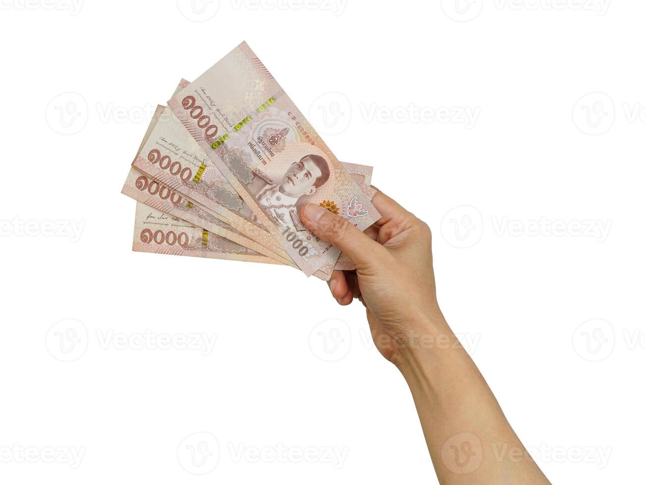 Asian woman holding Thai baht banknote money in hand isolated on white background with clipping path. photo