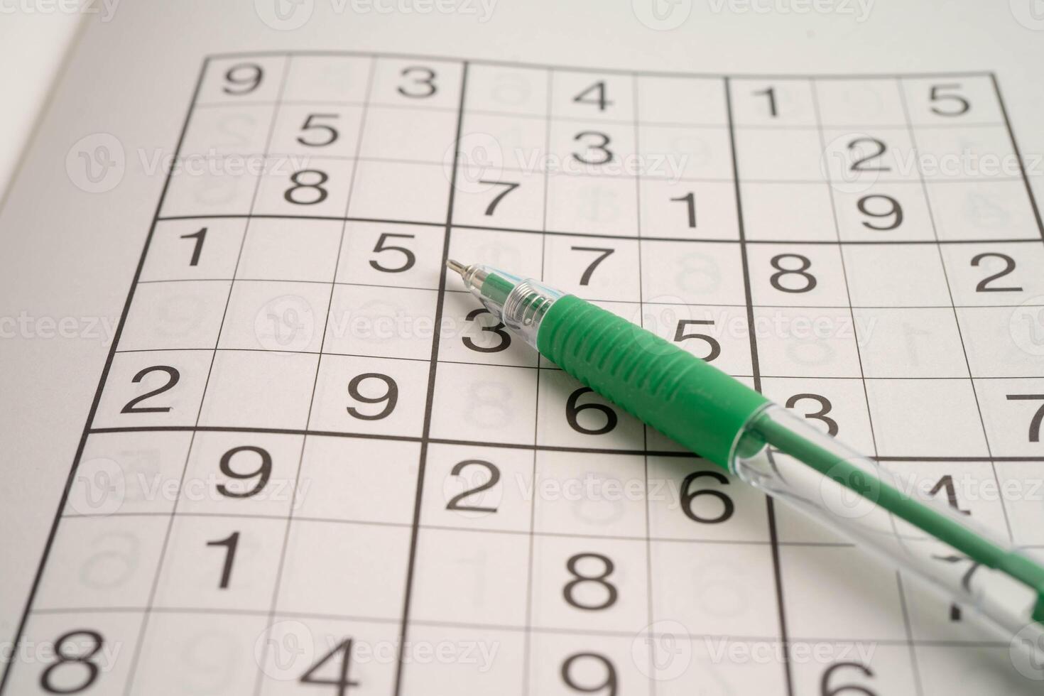 Sudoku puzzle, game to play for keep you brain younger for developing Alzheimer disease in senior patient. photo