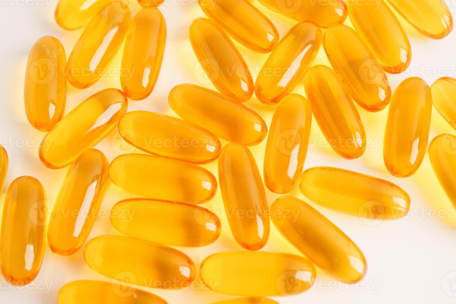 Fish oil or Cod liver oil gel in capsules with omega 3 vitamins, supplementary healthy food. photo