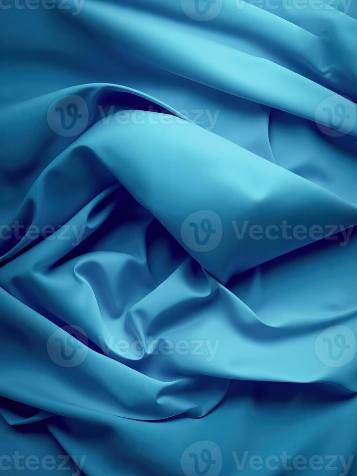 A blue fabric with folds and folds photo