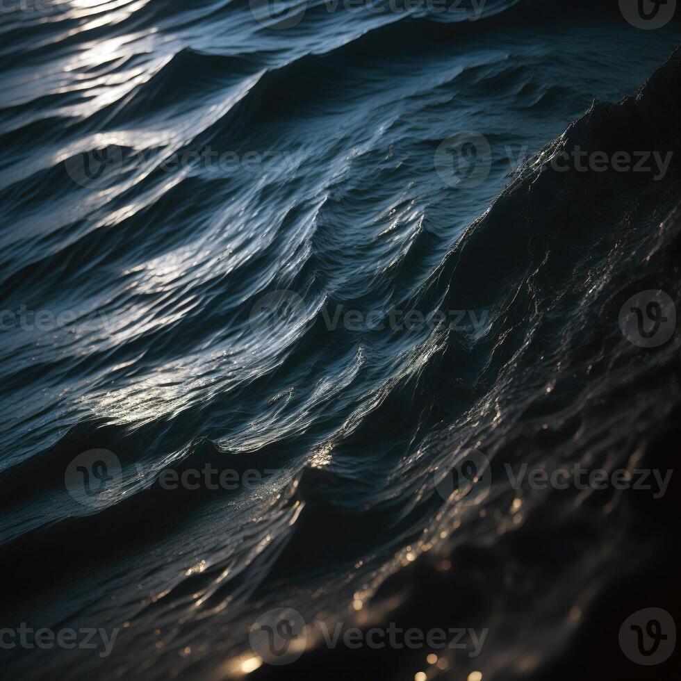 A close up of the ocean waves at sunset photo