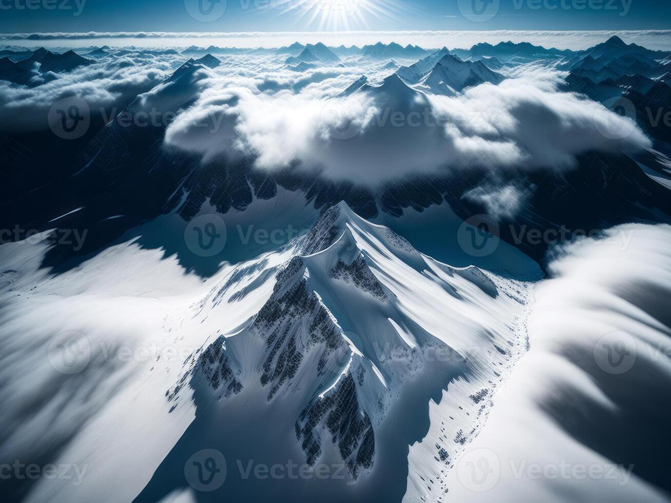 An aerial view of snow covered mountains photo
