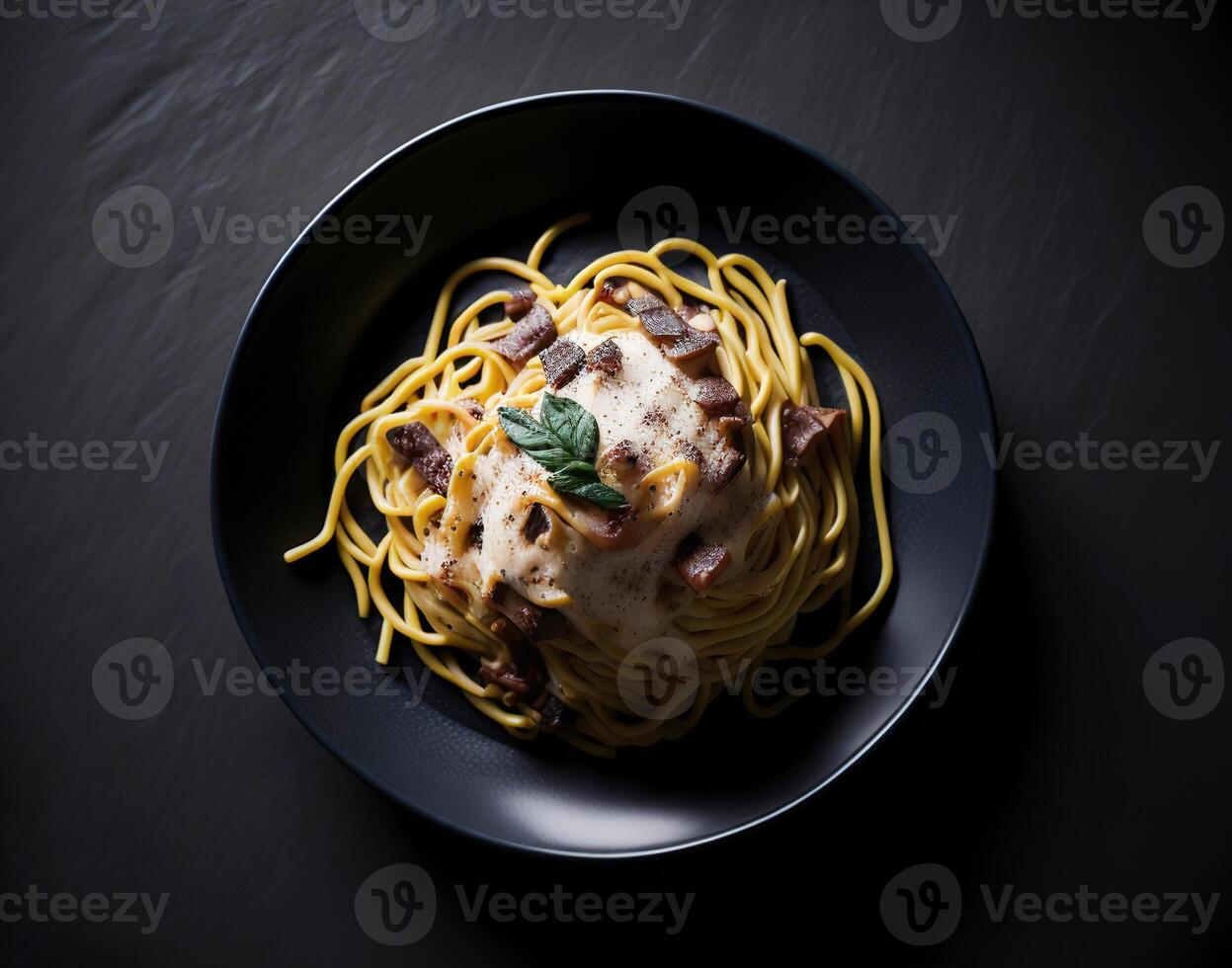 A plate of spaghetti with meat and cheese photo