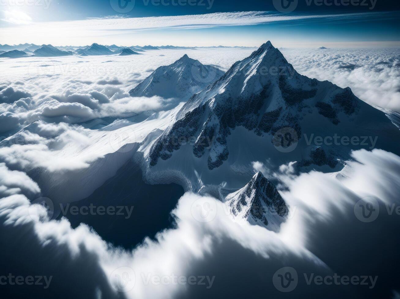 An aerial view of snow covered mountains photo