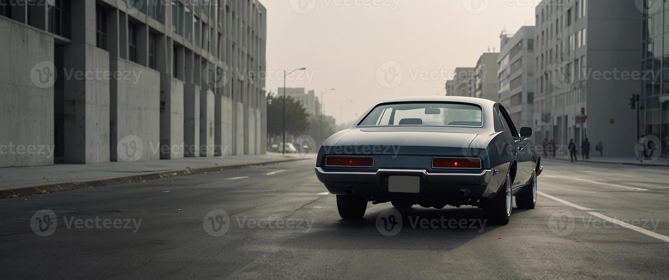 A car driving down a city street photo