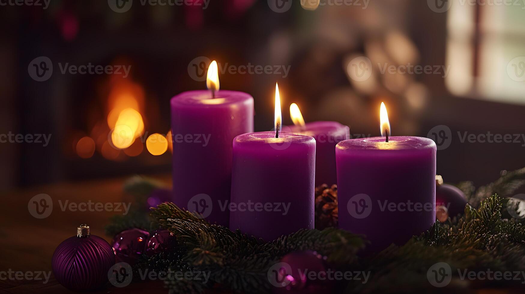 Warmly lit purple candles placed on wreath of pine. Advent begins. Celebrations and holiday content photo