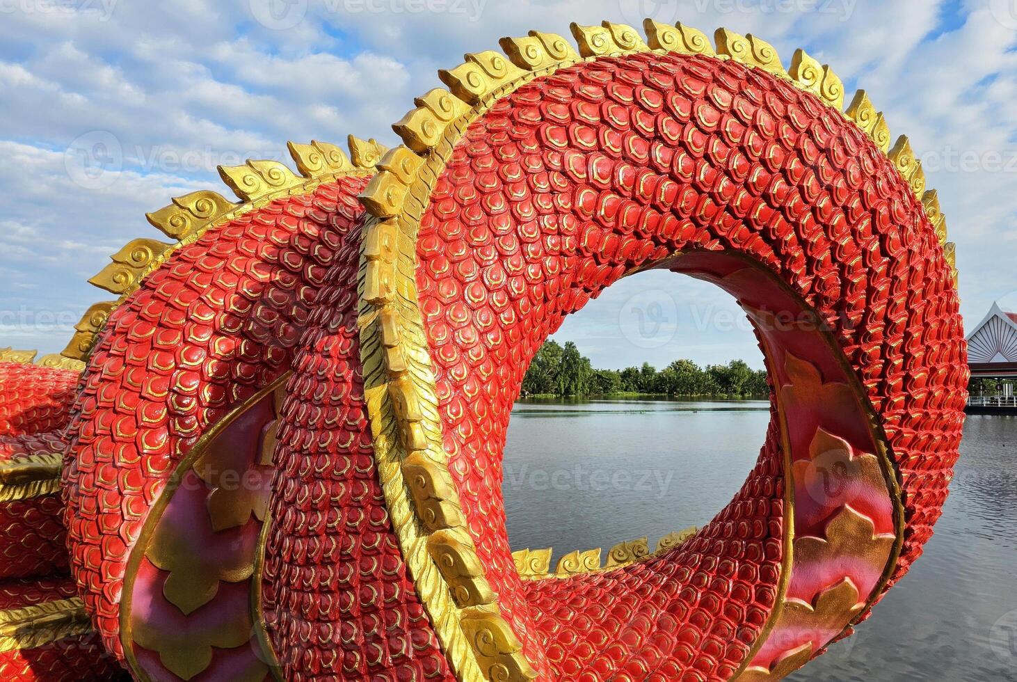 Red Body of Snake Statue or Naka Statue. photo