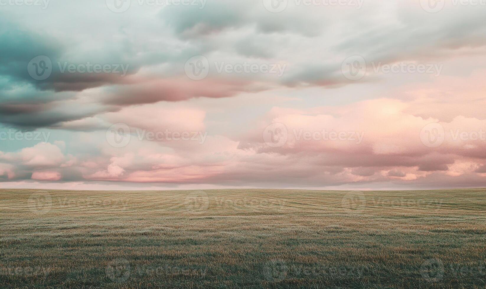 A cloudy sky with a pinkish hue photo