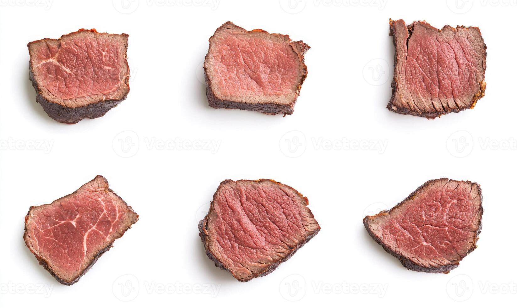 A close up of six different cuts of meat, all of which are red photo