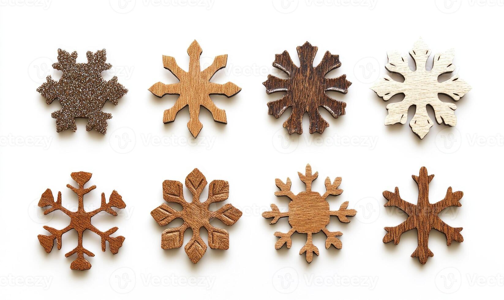 A collection of wooden snowflakes with different sizes and shapes photo