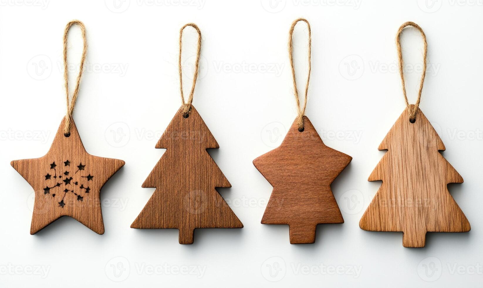 Four wooden Christmas tree ornaments hanging from a string photo