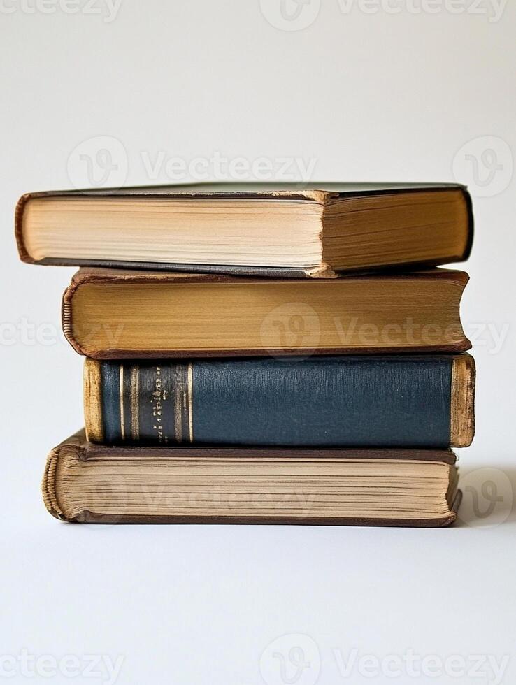 A stack of old books on a white background photo