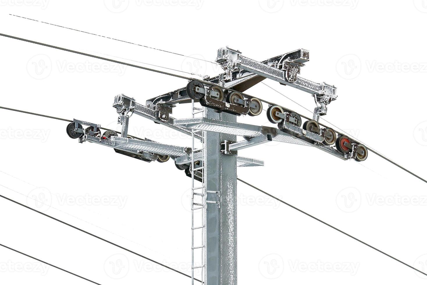 The machinery consists of a series of towers and cables that pull chairs up the mountain. The towers are made of steel and the cables are made of a synthetic material. photo