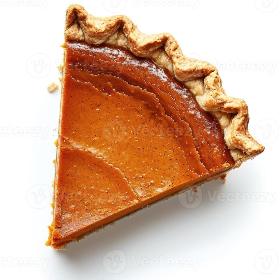 a slice of pumpkin pie on a white surface photo