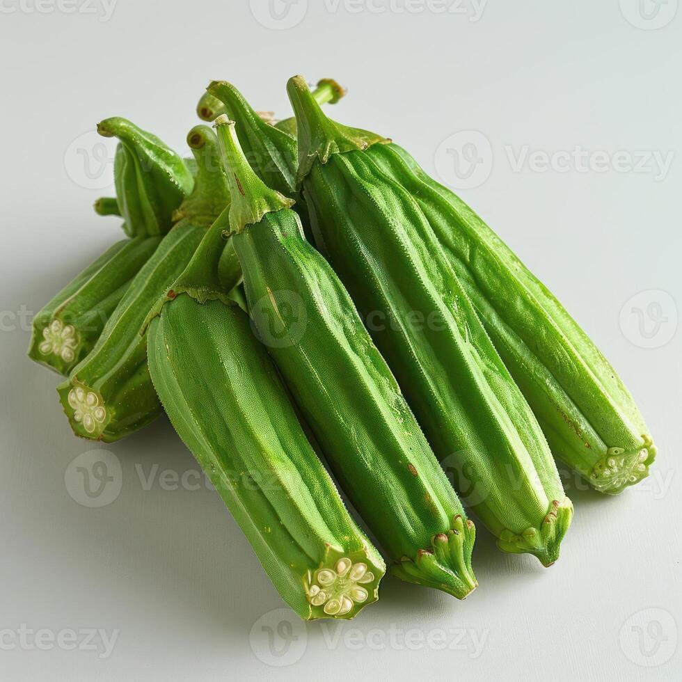 A collection of green vegetables with a focus on fava beans or fresh peas. These are small, photo