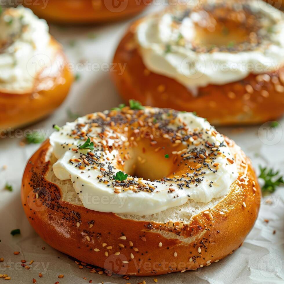 a bagel covered in cream cheese and sprinkles photo