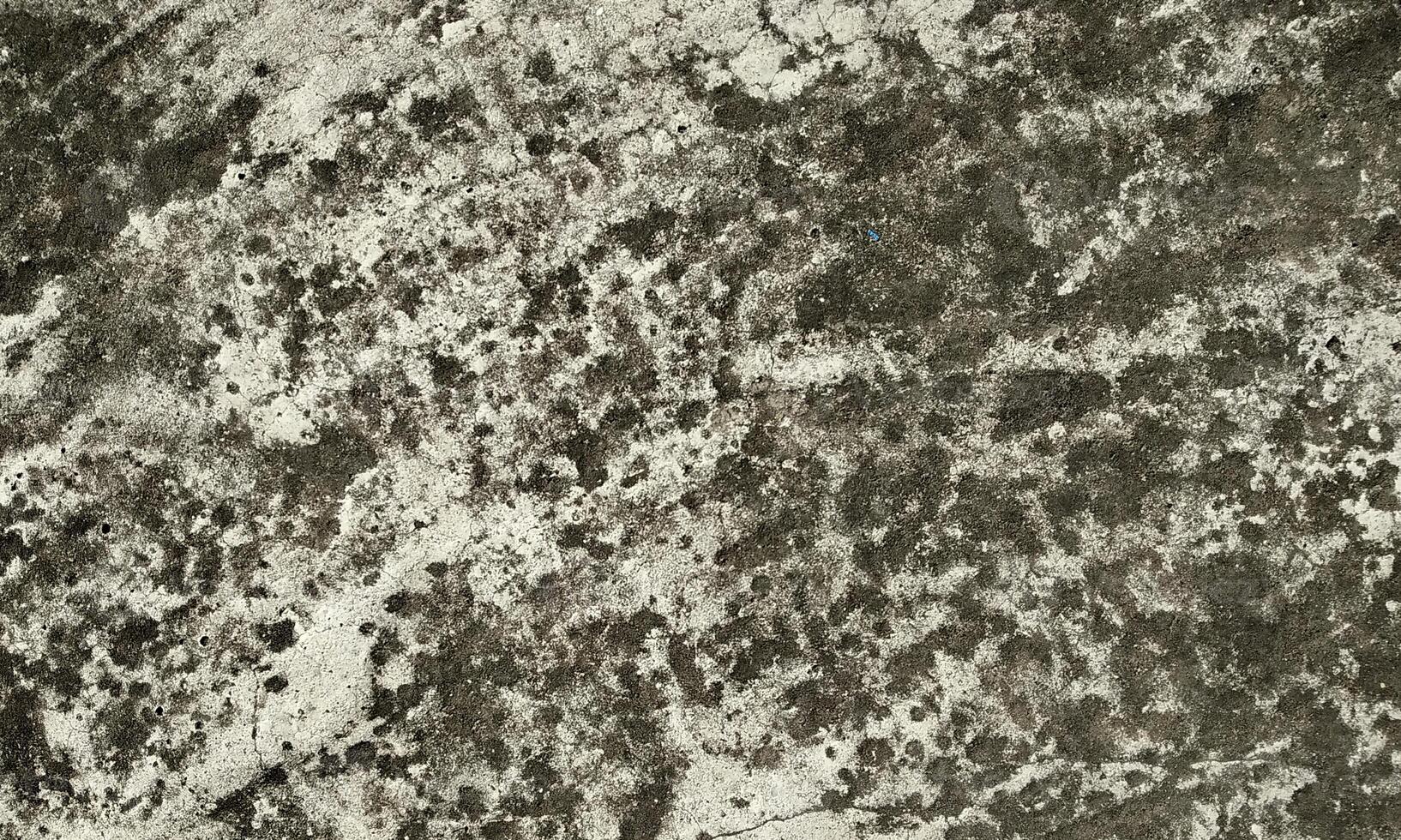 Peeling Grunge Wall Texture.Patched and Deteriorating Wall.Rusty and Dilapidated Wall Surface.Chipped and Peeling Plaster Texture.Cracked and Textured Cement Wall.Rough and Flaking Mortar Texture. photo