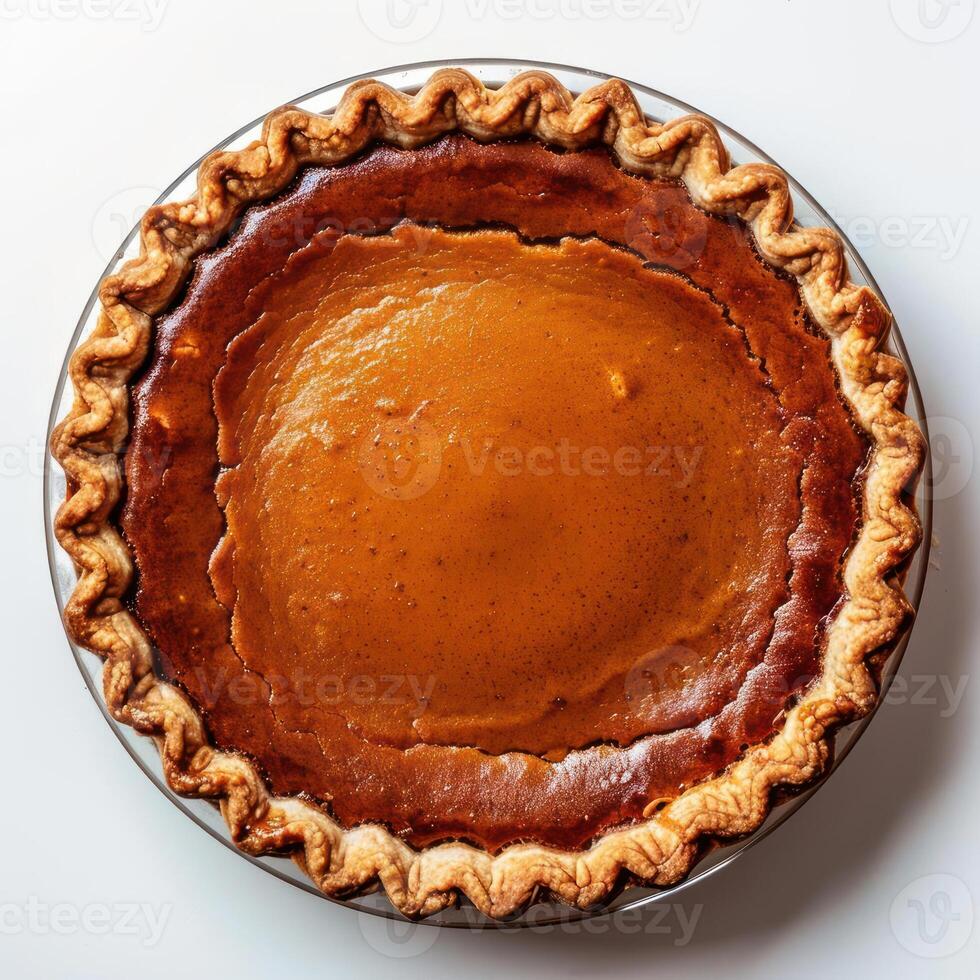 Freshly baked pumpkin pie with a golden brown crust, topped with a sweet and gooey pumpkin filling. photo