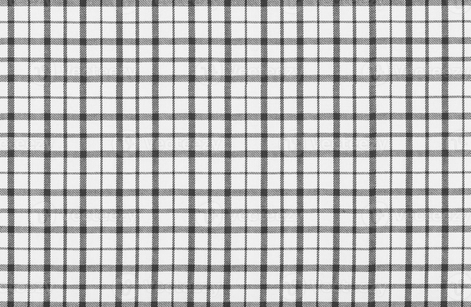 gray and black, white texture of factory fabric for tailoring, cotton checkered fabric photo