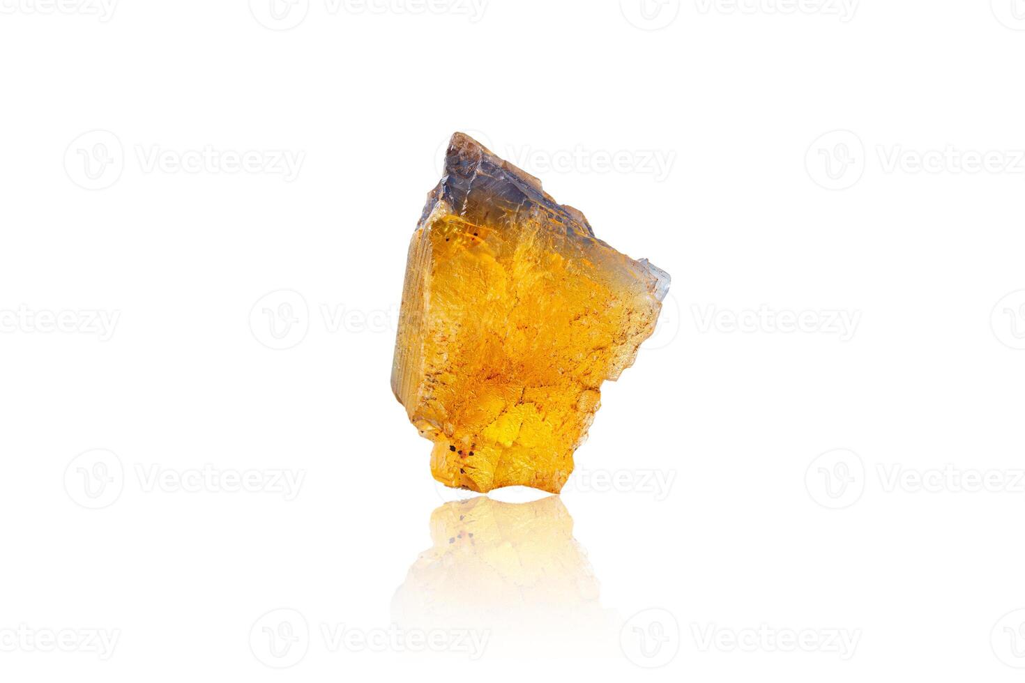 Macro mineral stone Fluorite yellow and blue color on a white background photo