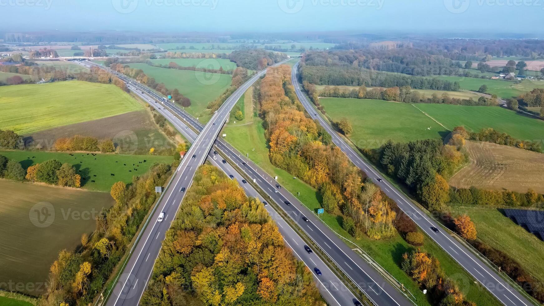 Aerial view on the A7 motorway in northern Germany between fields and meadows. photo
