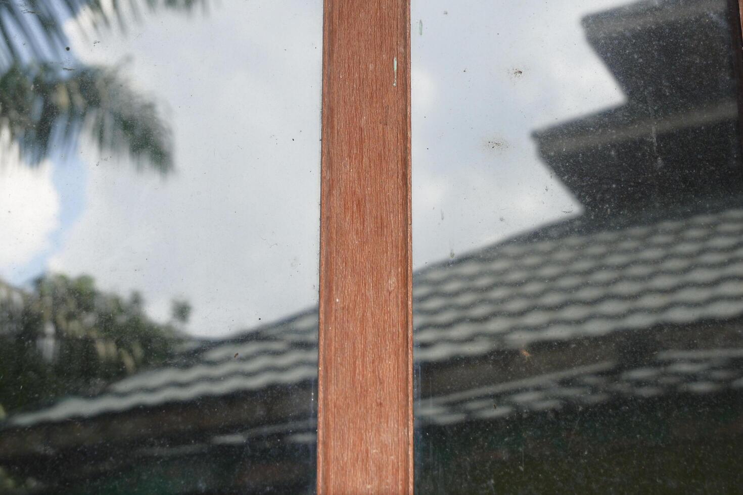 wood with dirty window glass photo