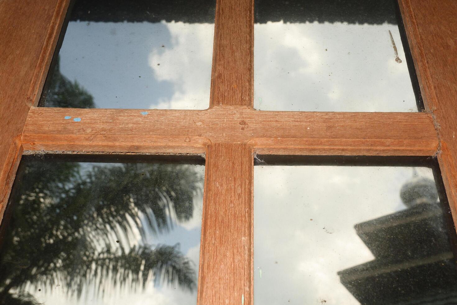 wood with dirty window glass photo