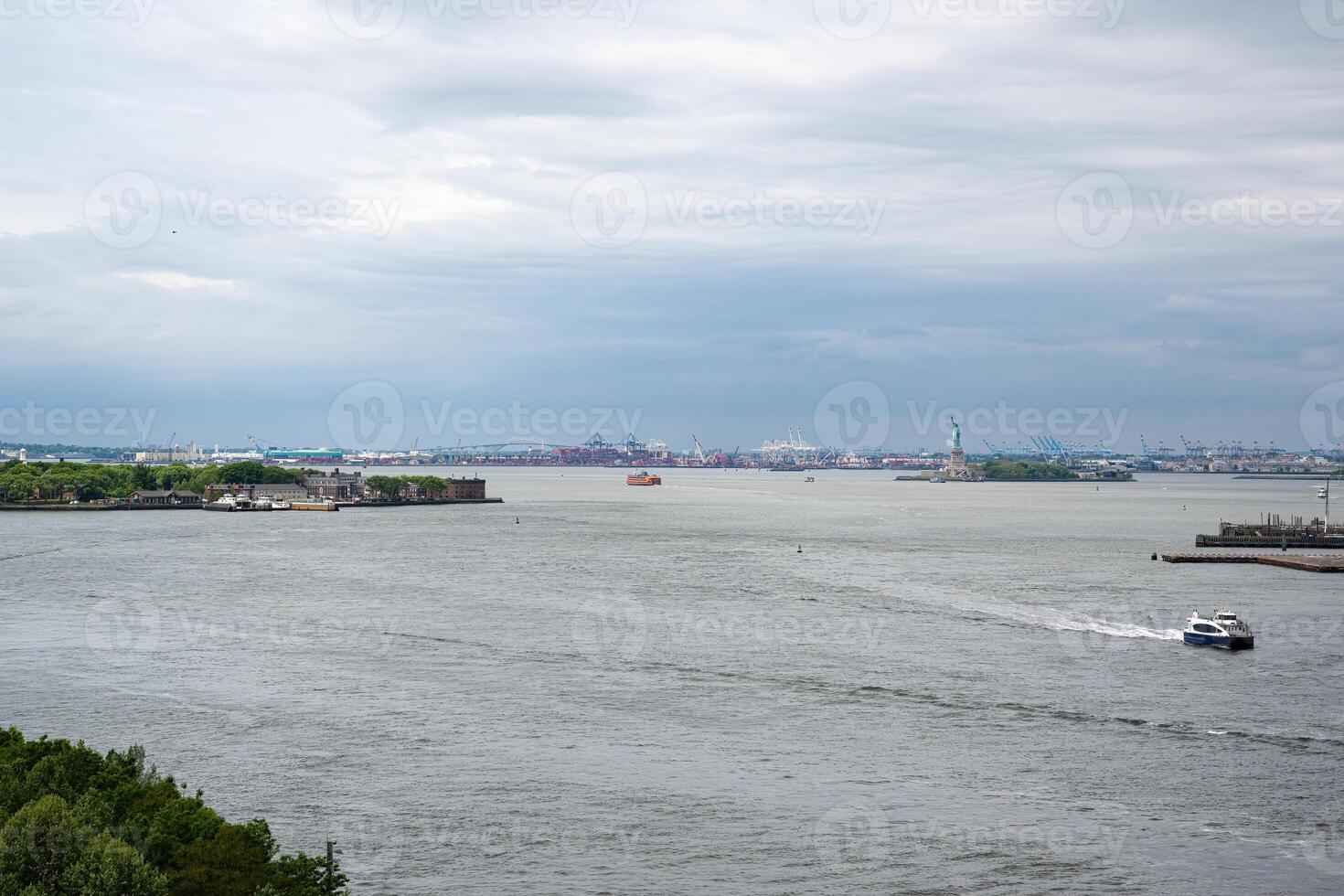 View from the Brooklyn Bridge towards the Statue of Liberty photo