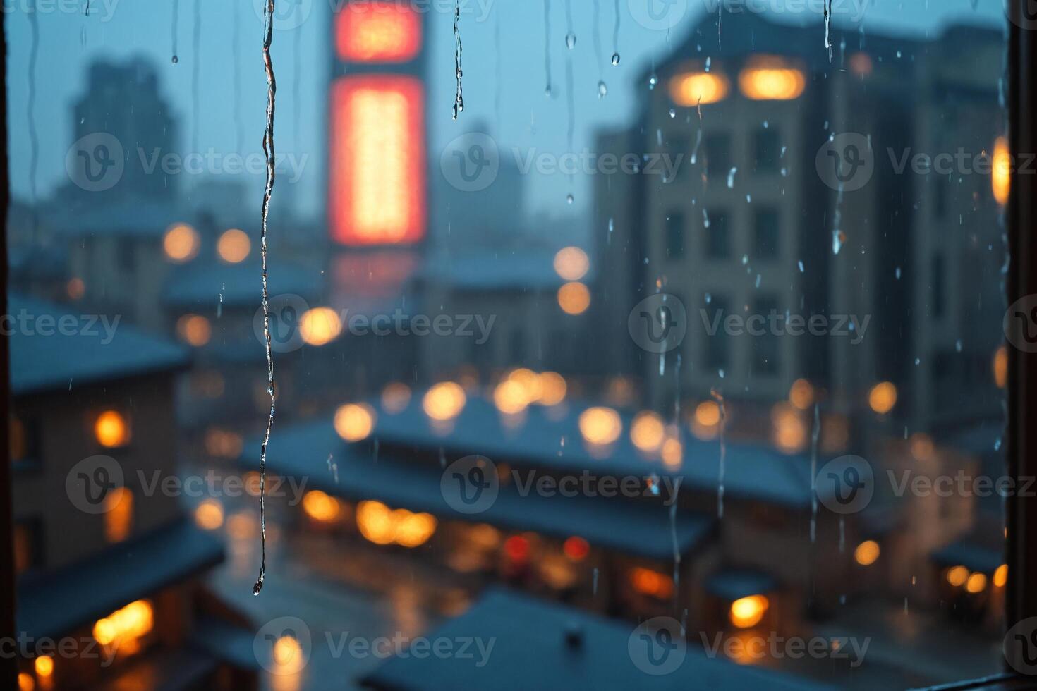 Rainy Cityscape View Through Window with Raindrops photo