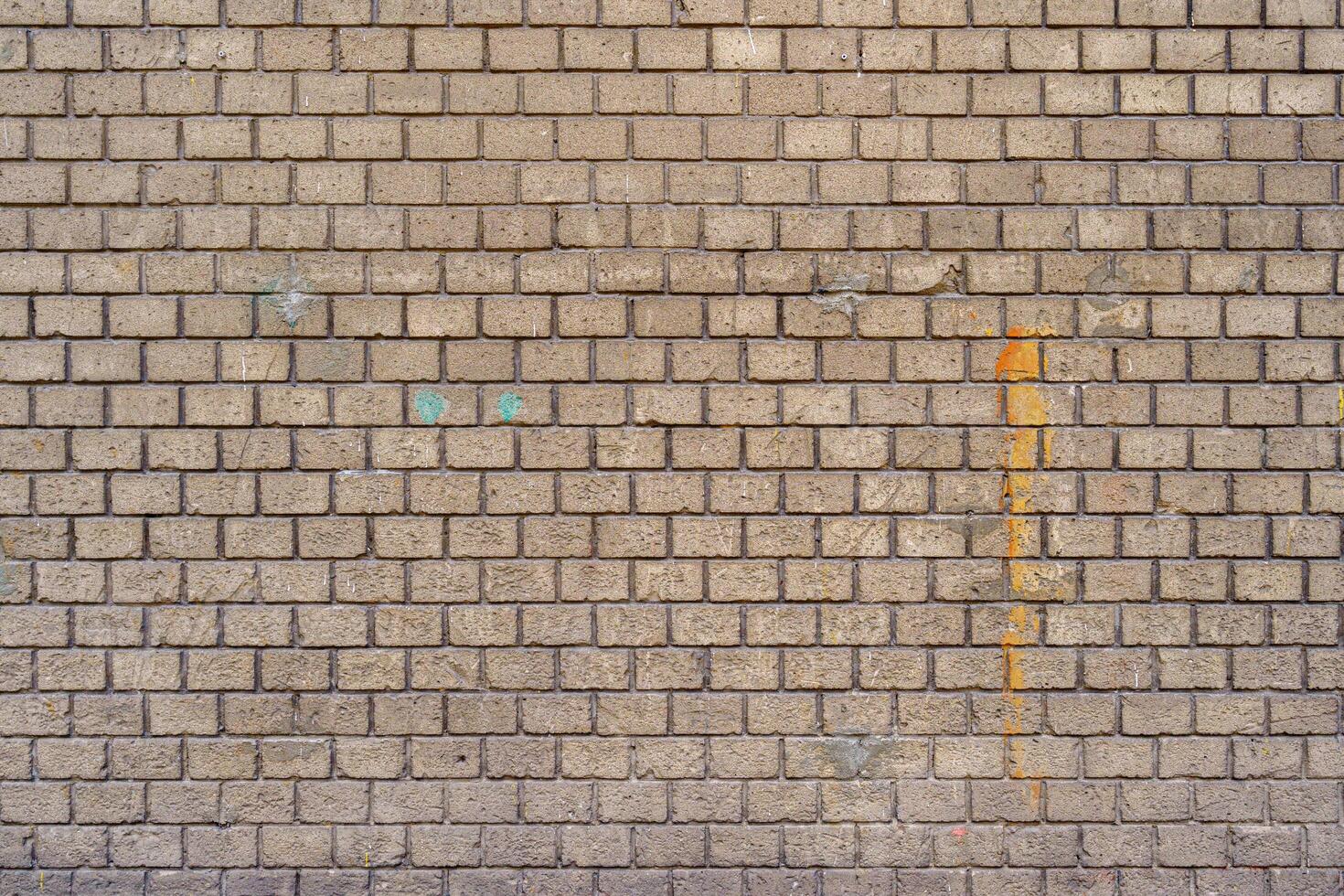 An old brick wall aged by time. photo