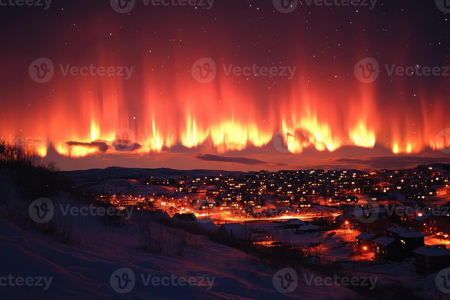 Red Aurora Borealis Over a Snowy Town photo