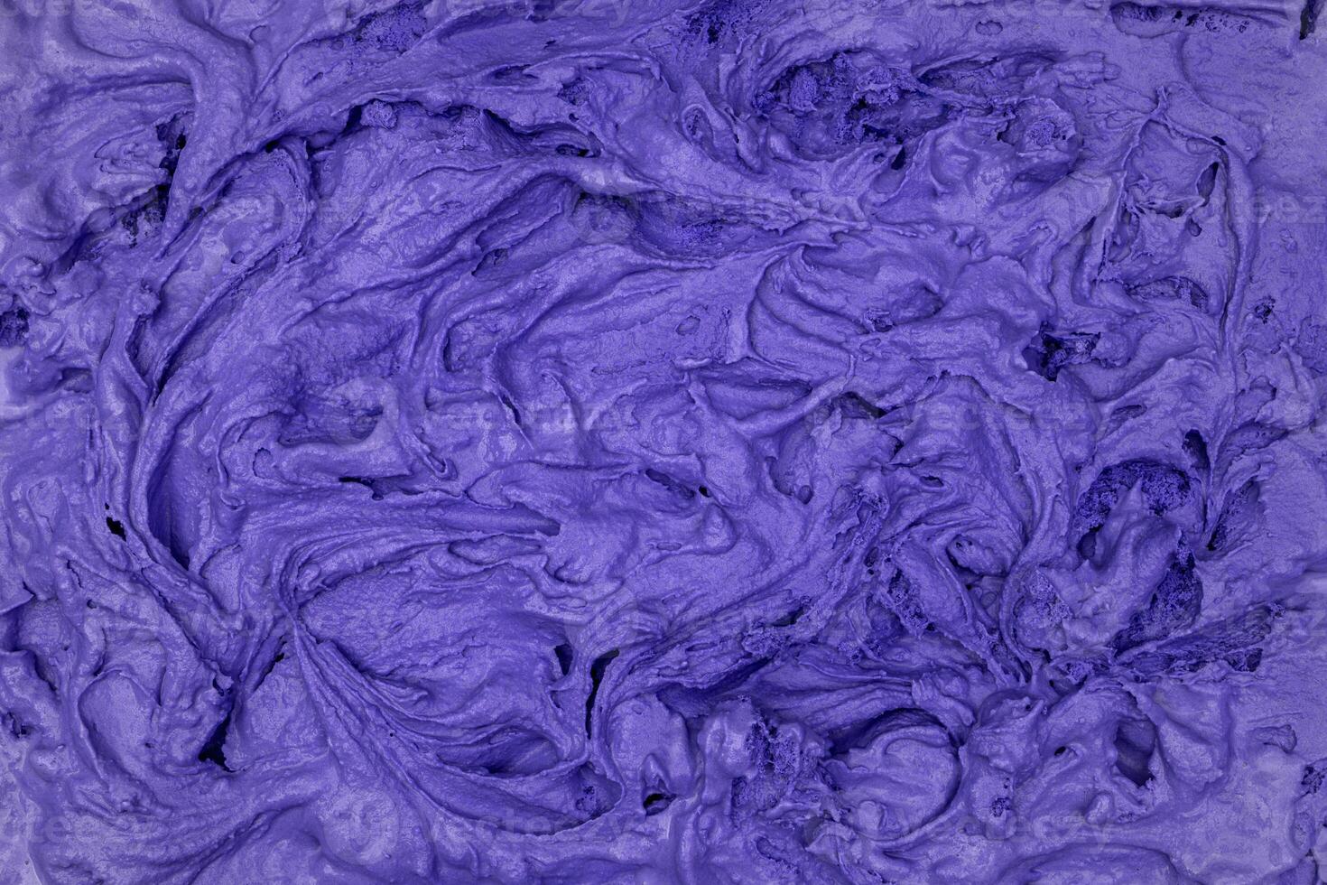 Blueberry ice cream texture. Top view. Delicious cool treat. photo
