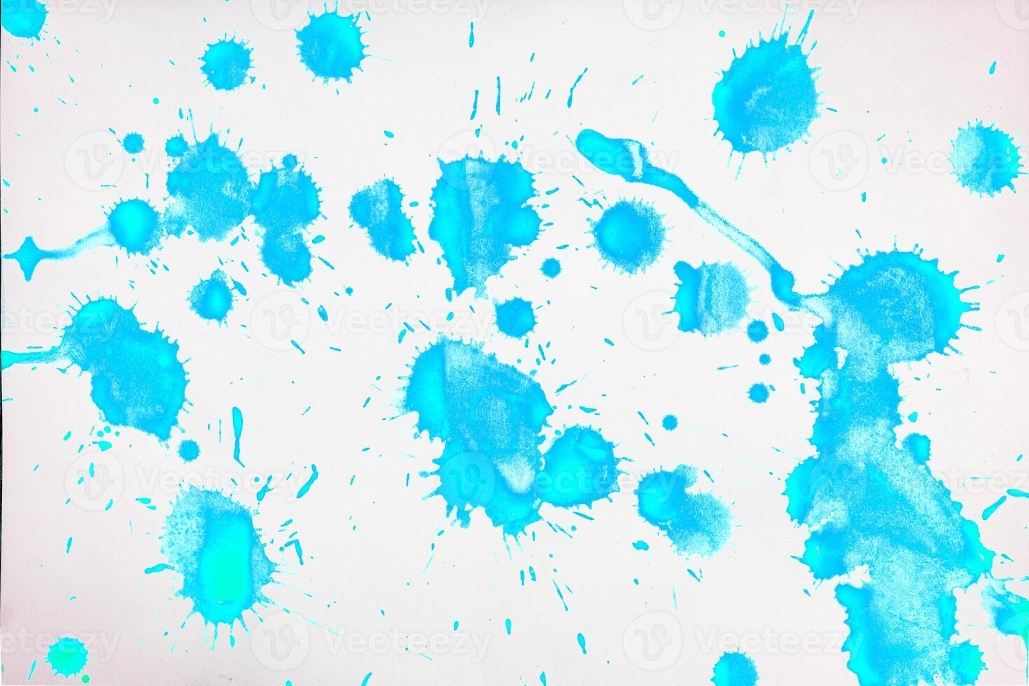 Blue blots and spots on a white background. photo