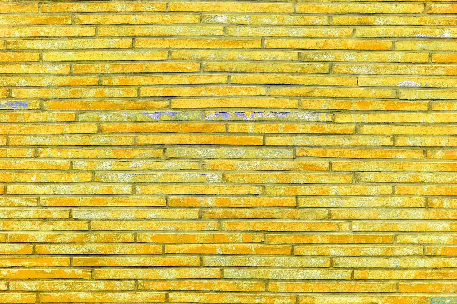 Yellow brick wall. Background of modern interior design. photo